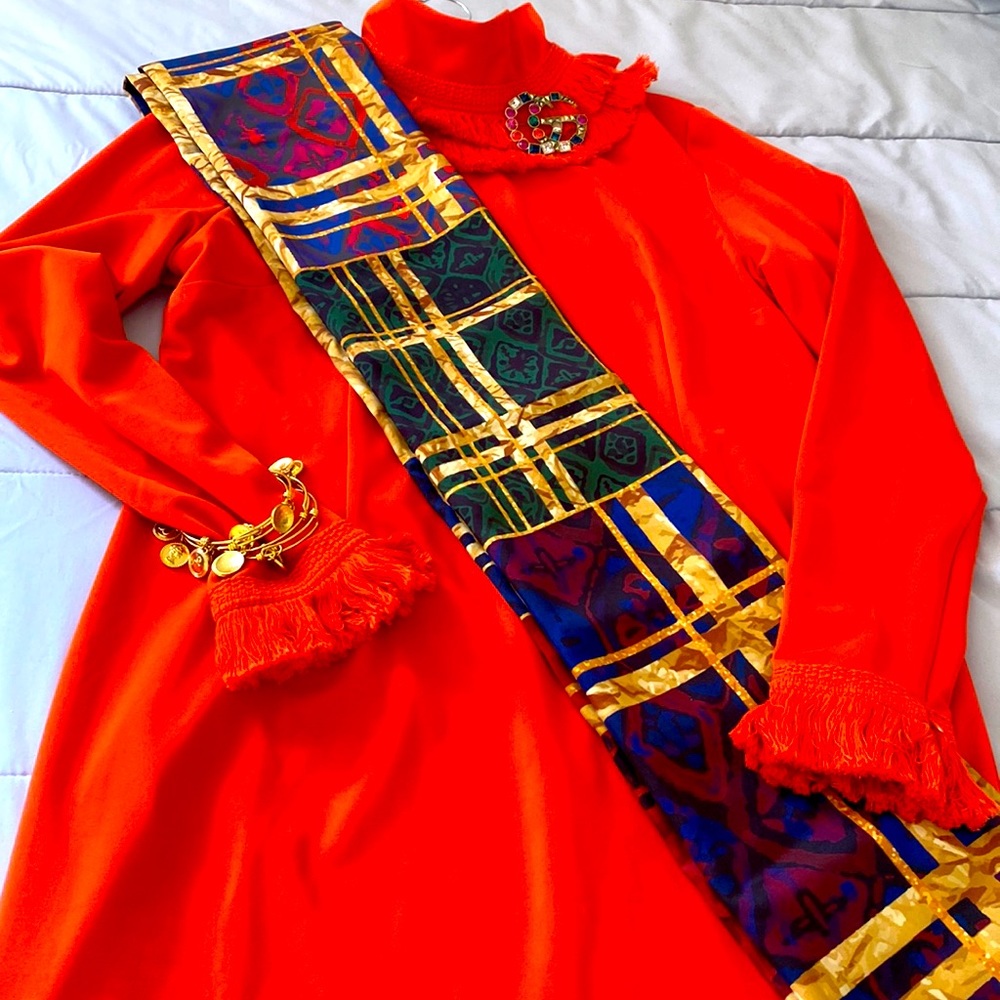 Sassy Jones, orange fringe dress, size 2x. Smoke free environment and no pets.